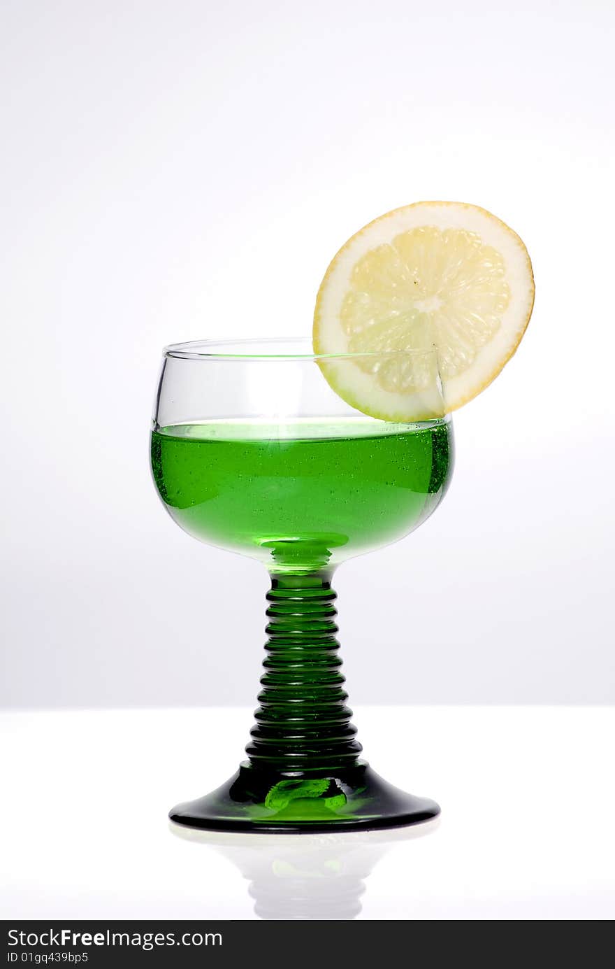 Cocktail with lime isolated on the white. Cocktail with lime isolated on the white