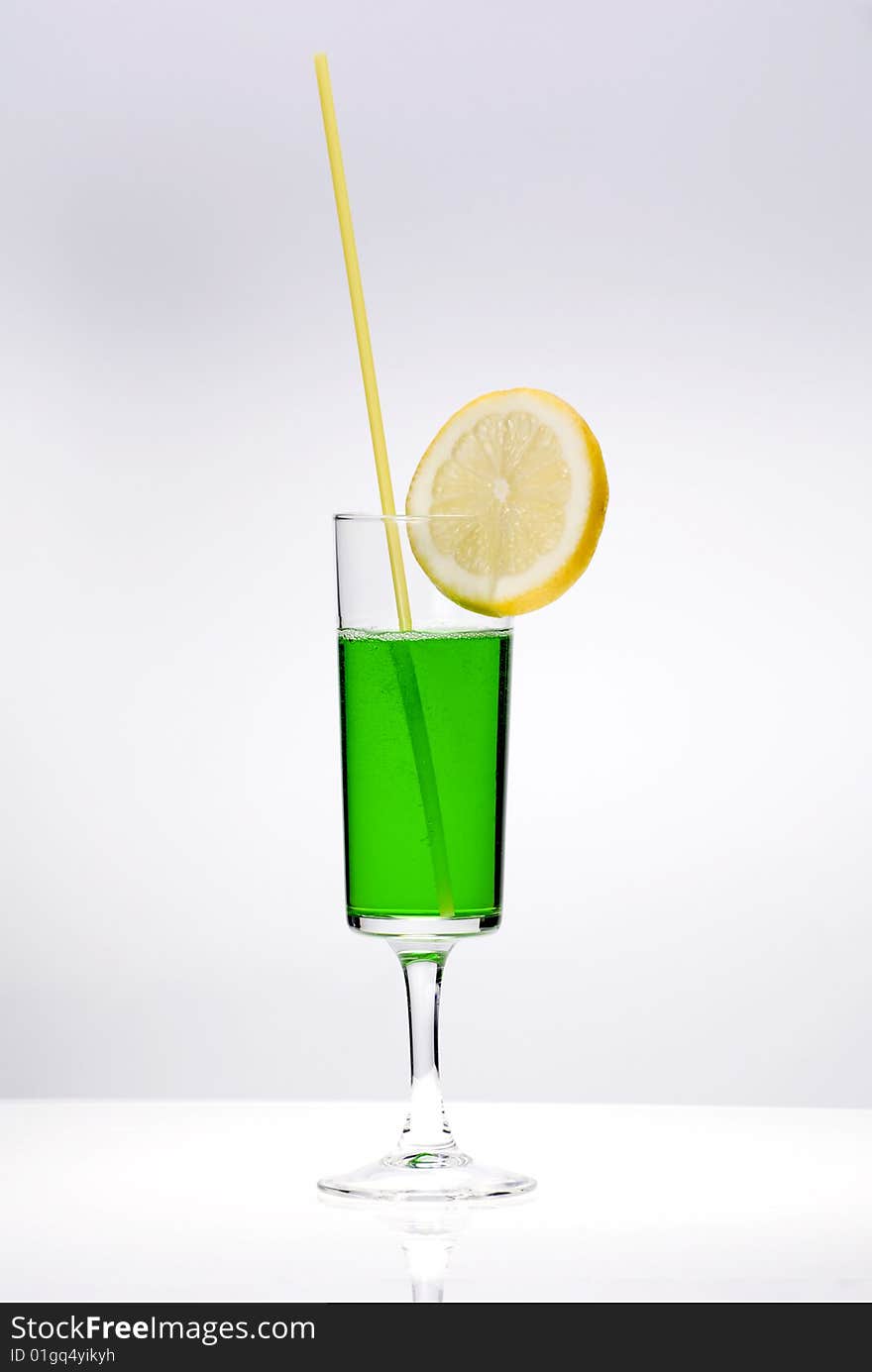 Cocktail with lime isolated on the white. Cocktail with lime isolated on the white