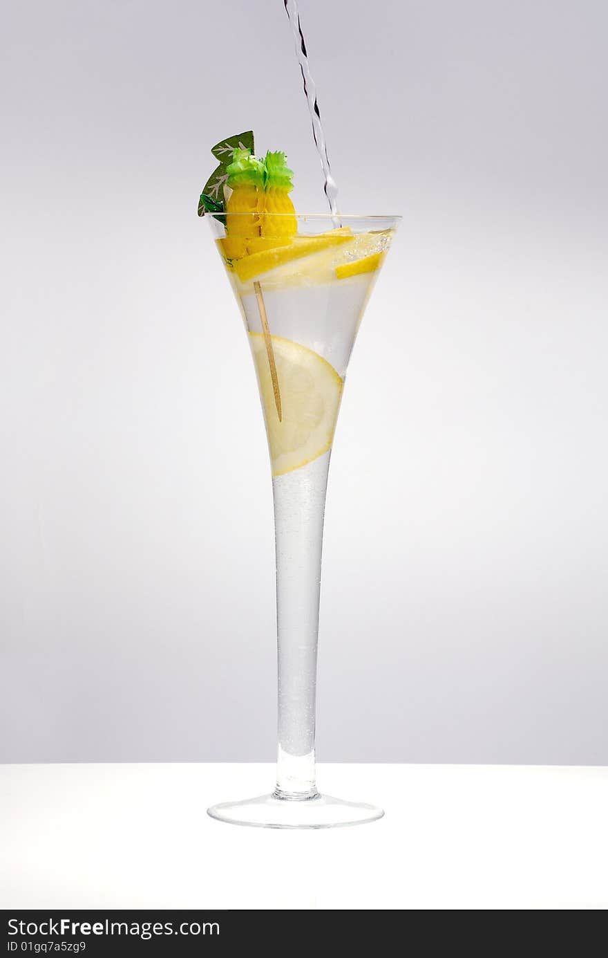 Cocktail with lime isolated on the white. Cocktail with lime isolated on the white