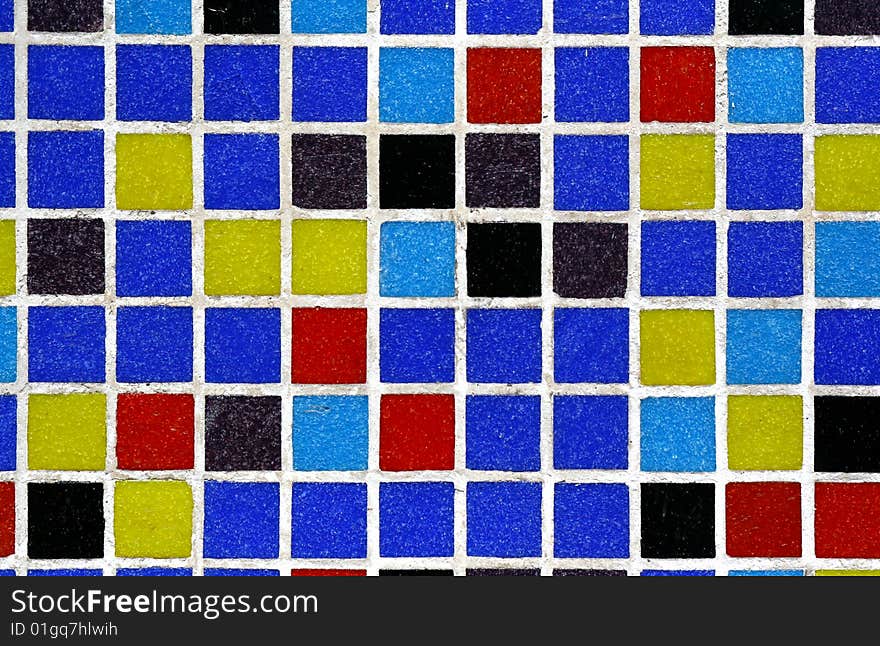 Colourful glass tiles on a wall. Colourful glass tiles on a wall