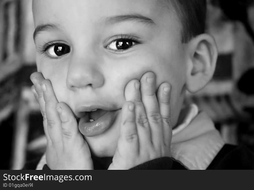 Toddler makes a face while playing around. Toddler makes a face while playing around.