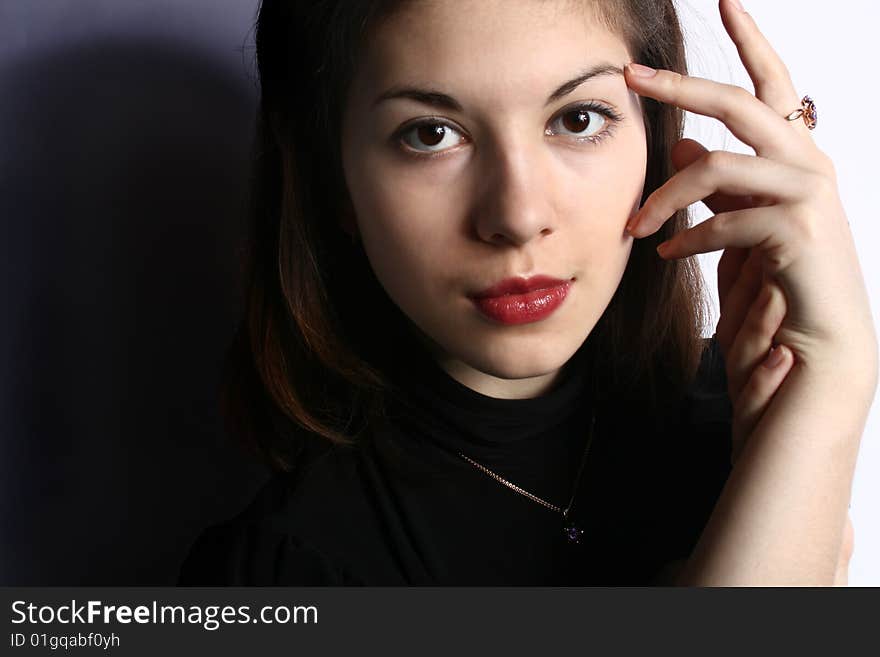 Portrait of the girl with a ring on a hand close up. Portrait of the girl with a ring on a hand close up.