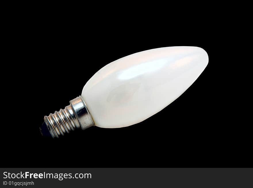 Light bulb on black background