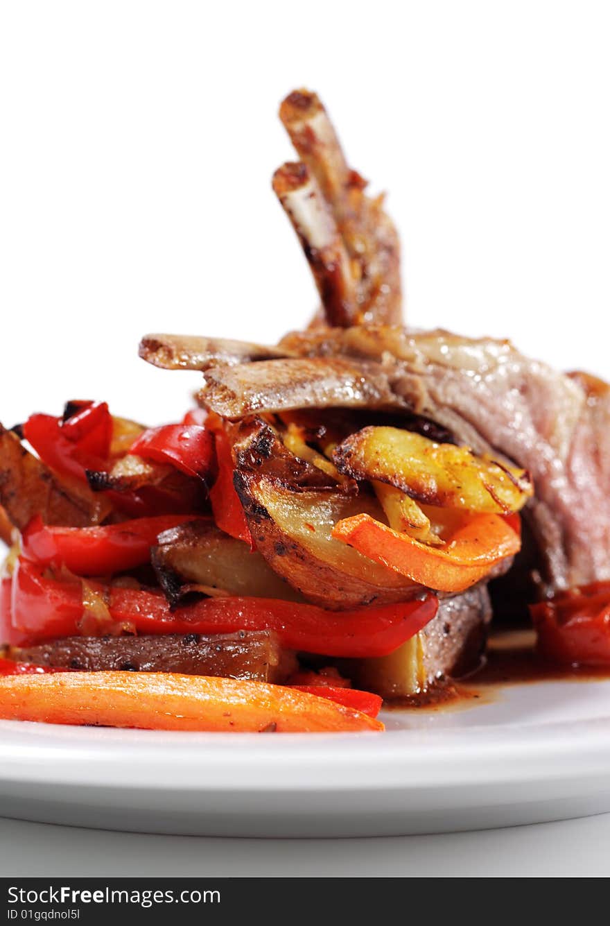 Roasted Lamb Chops with Asian-Style Vegetables. Isolated on White Background