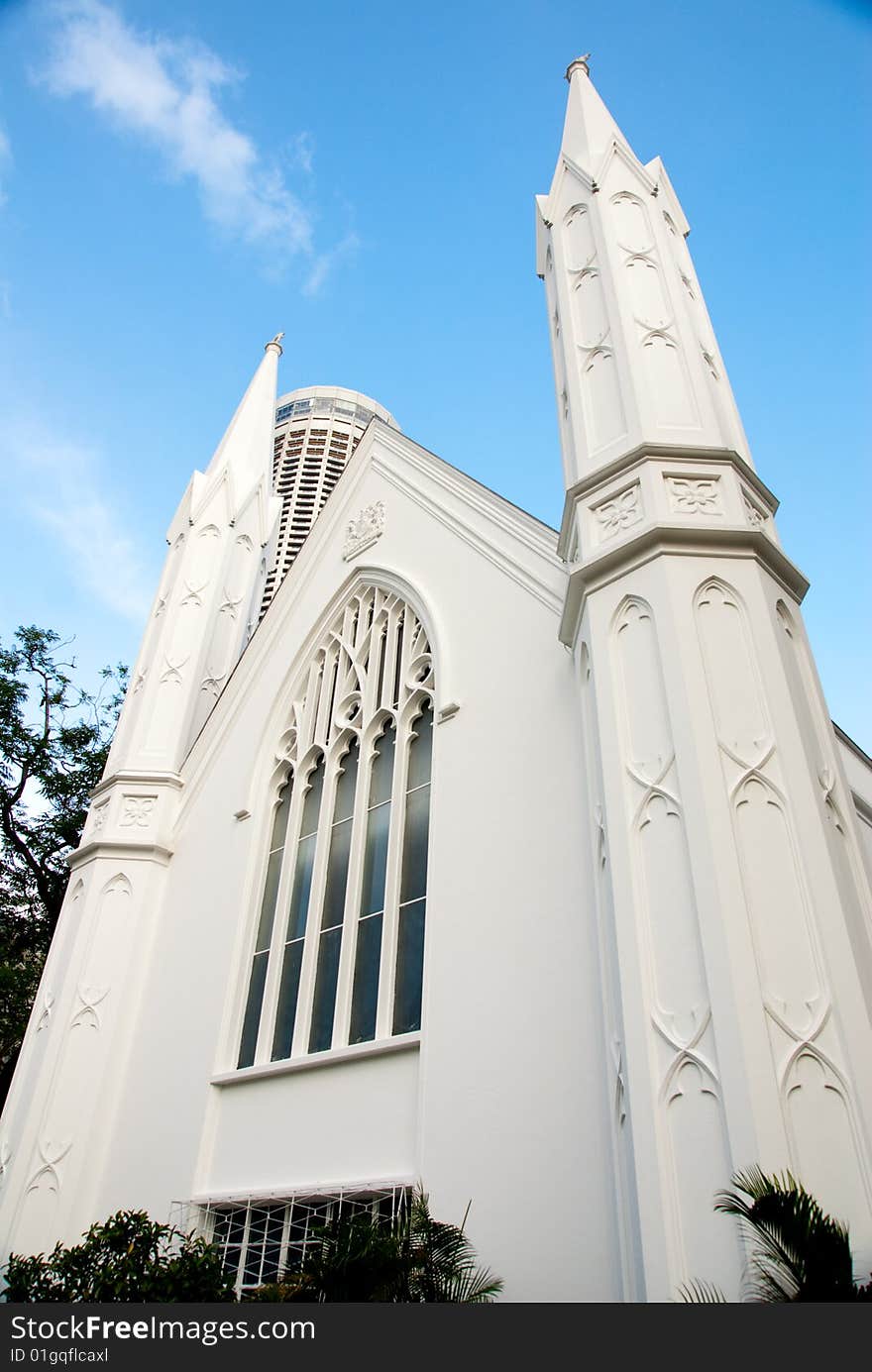 White church exterior against blue sky in singapore