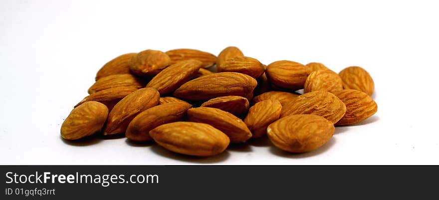 Collection of almonds isolated on white.