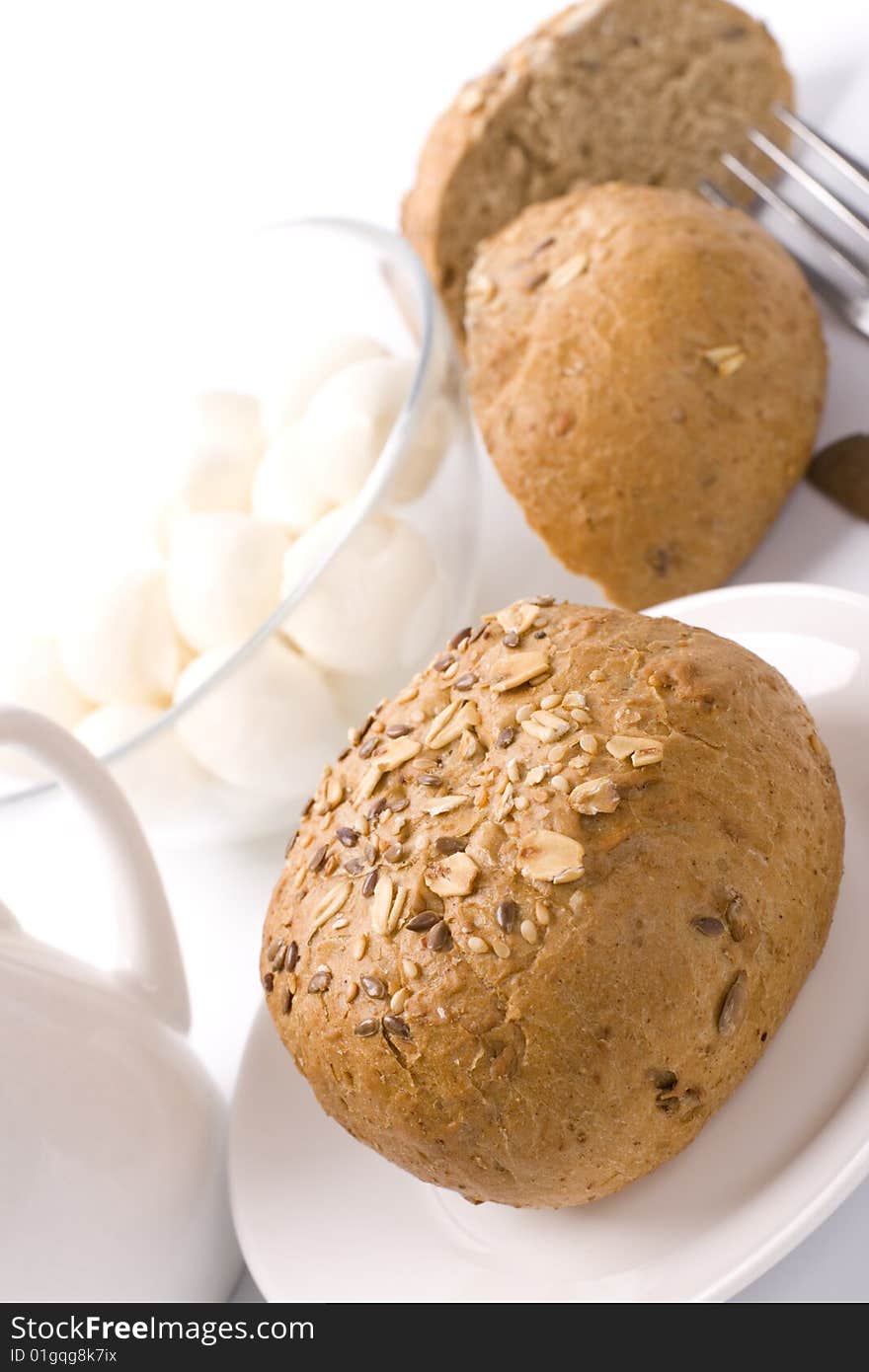 Bread and mozzarella closeup on white