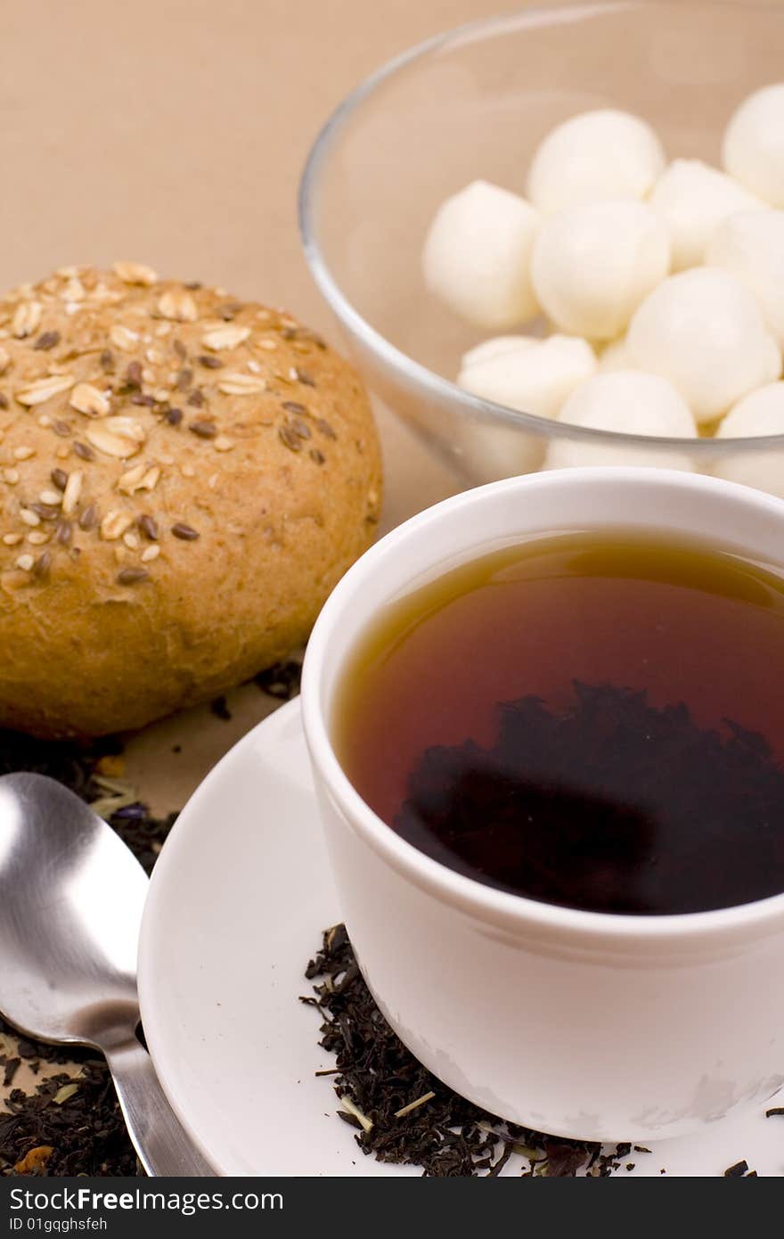 Cup of tea, mozzarella and bread closeup