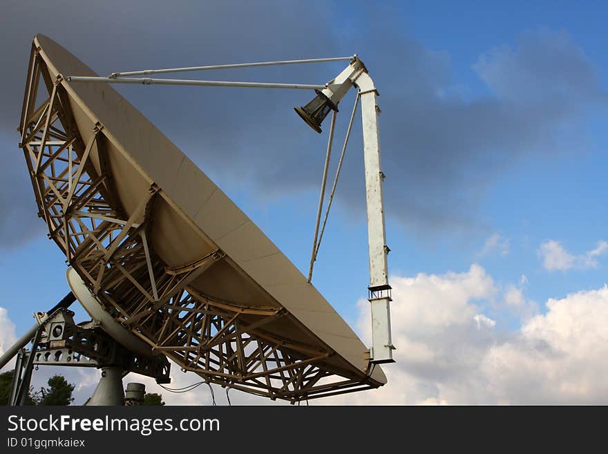 Antenna over the blue sky with some clouds. Antenna over the blue sky with some clouds