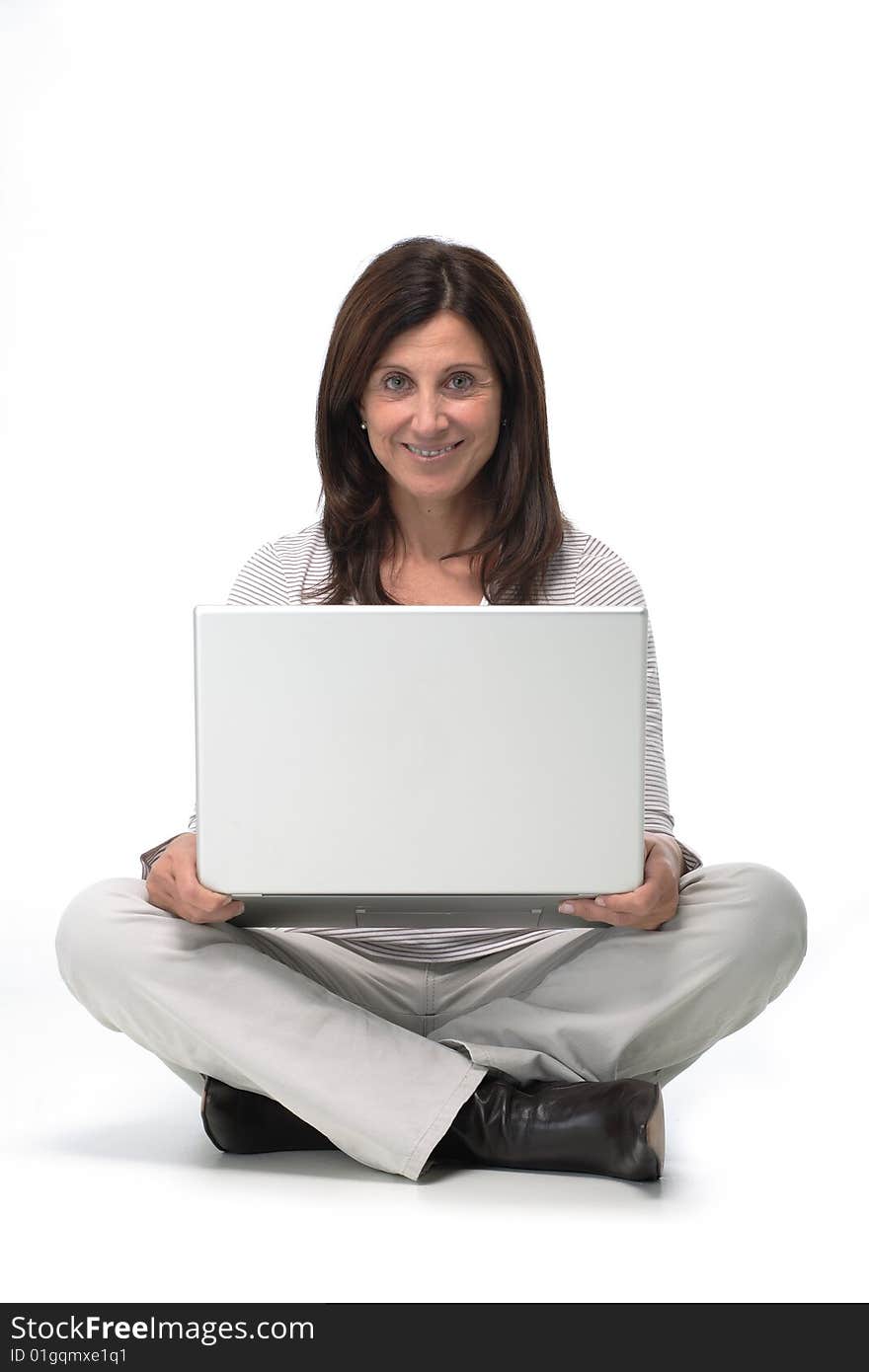 Woman working on a laptop from home. Woman working on a laptop from home