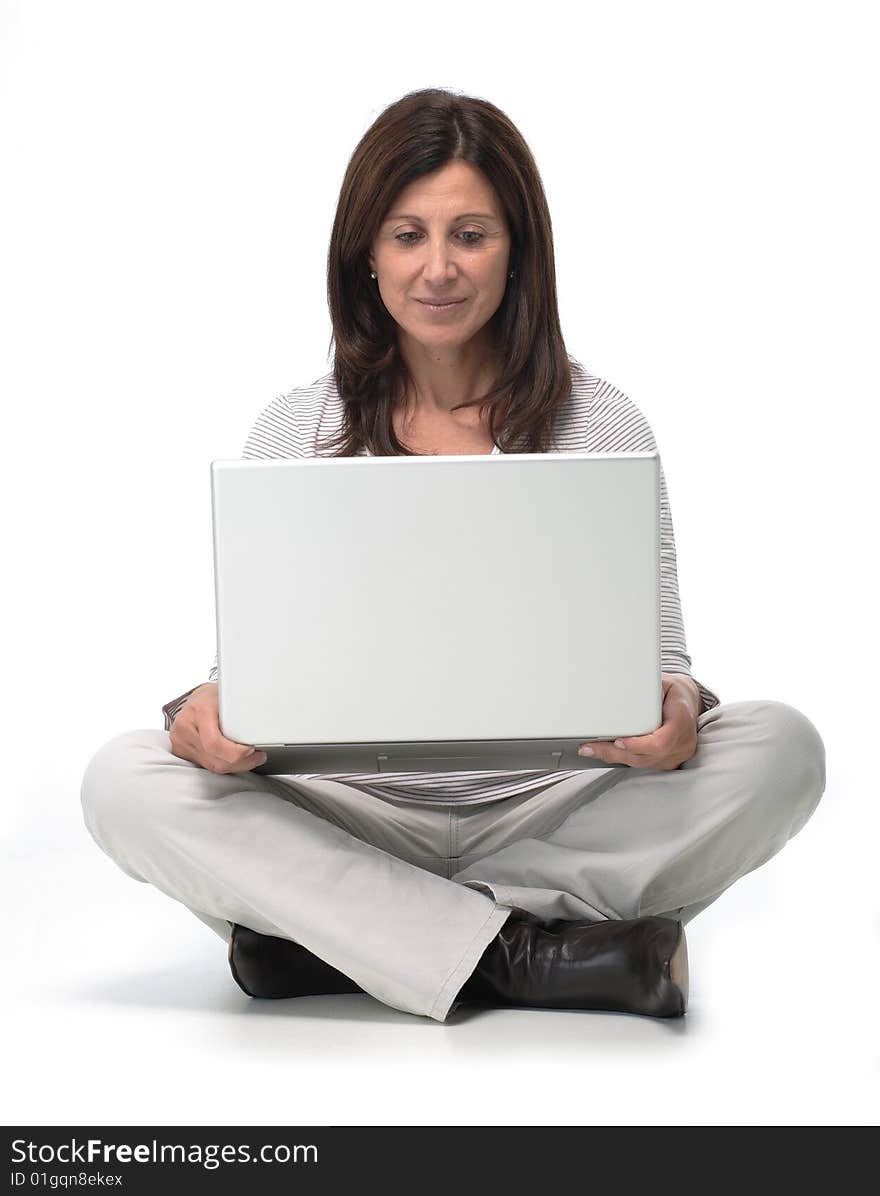 Woman working on a laptop from home. Woman working on a laptop from home