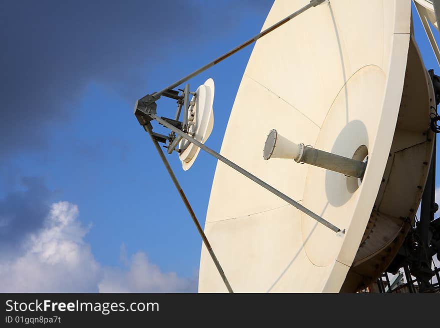 Antenna over the blue sky with some clouds. Antenna over the blue sky with some clouds