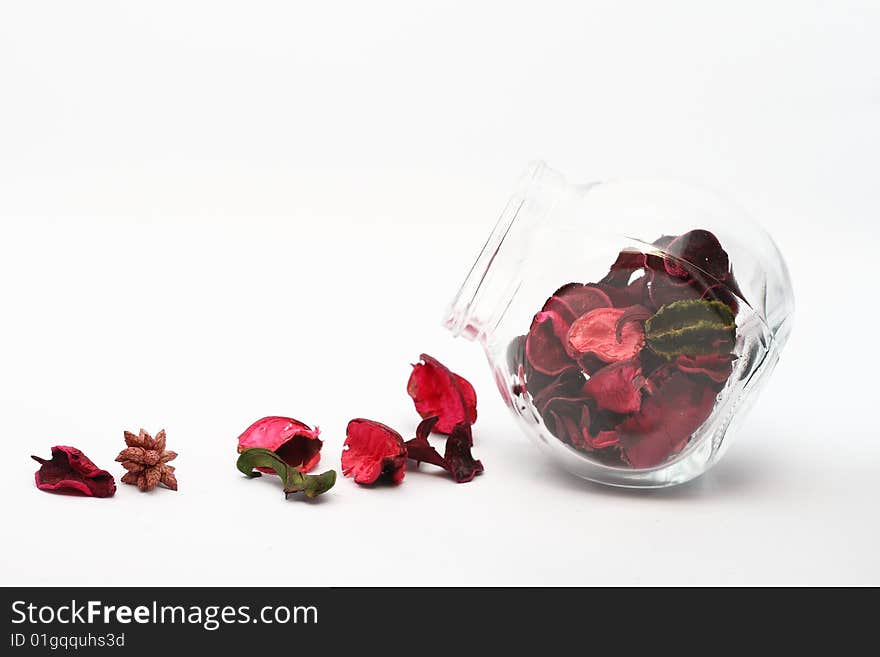 Petals and glass bottle