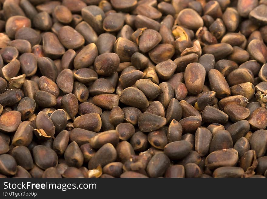 Close-up siberian cedar nuts texture to background