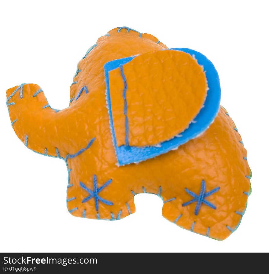 Funny orange leather handmade elephant from Thailand on white background