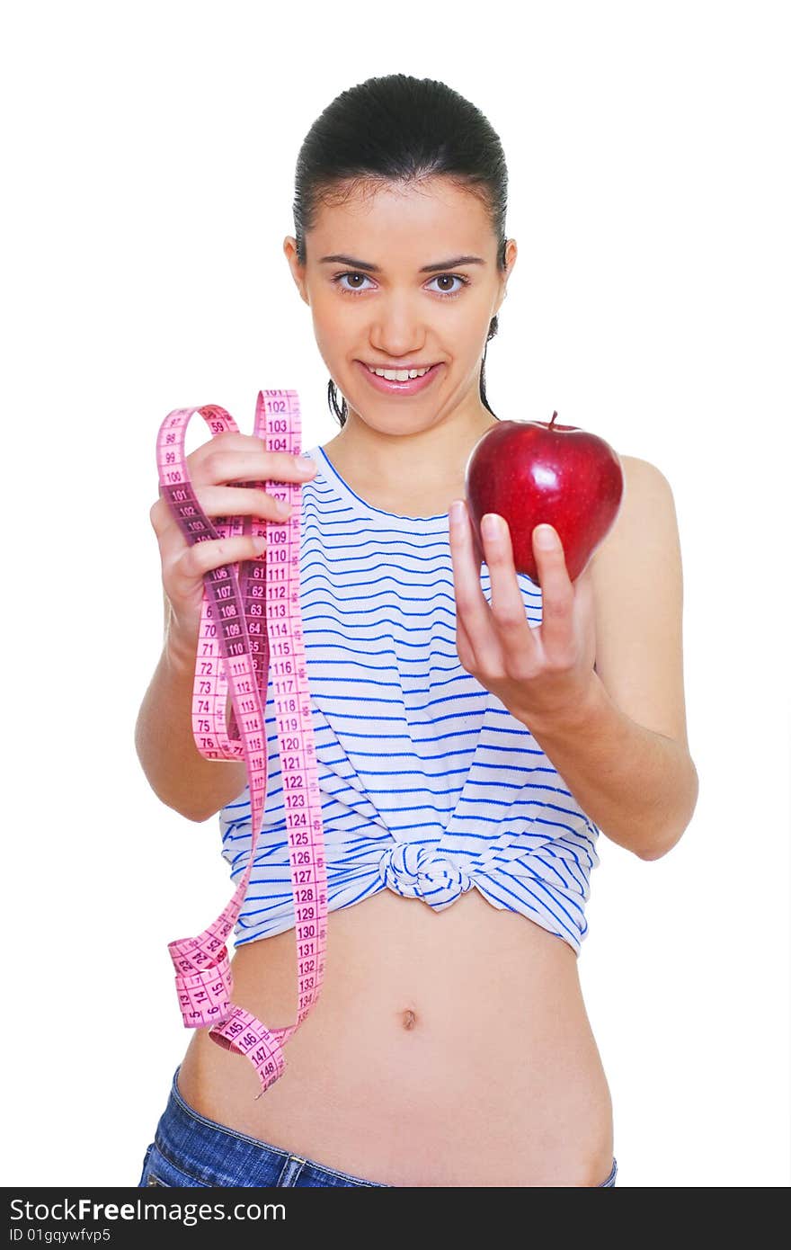 Portrait of cute young woman holding red apple and measuring tape. Portrait of cute young woman holding red apple and measuring tape