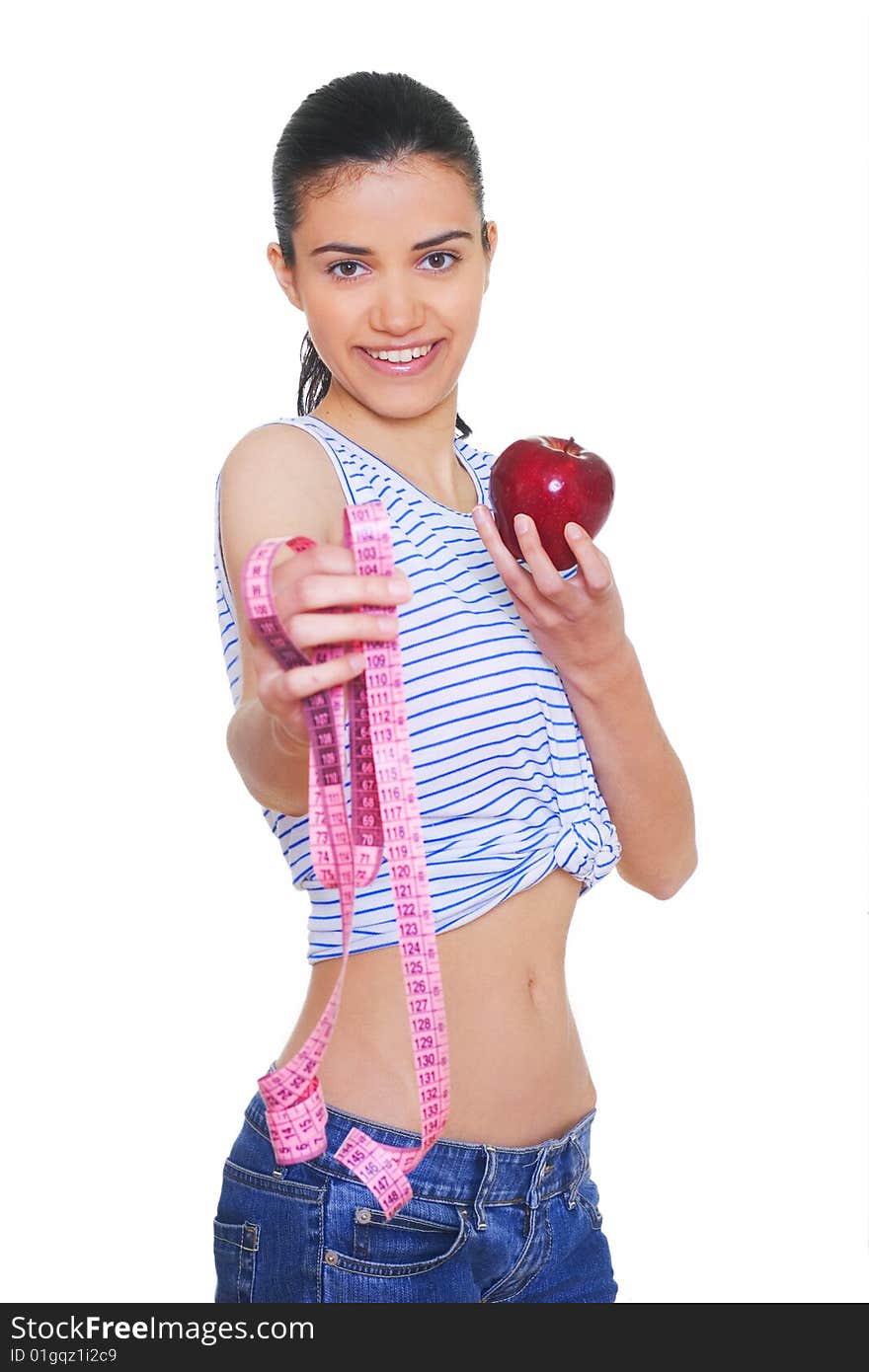 Portrait of cute young woman holding red apple and measuring tape. Portrait of cute young woman holding red apple and measuring tape