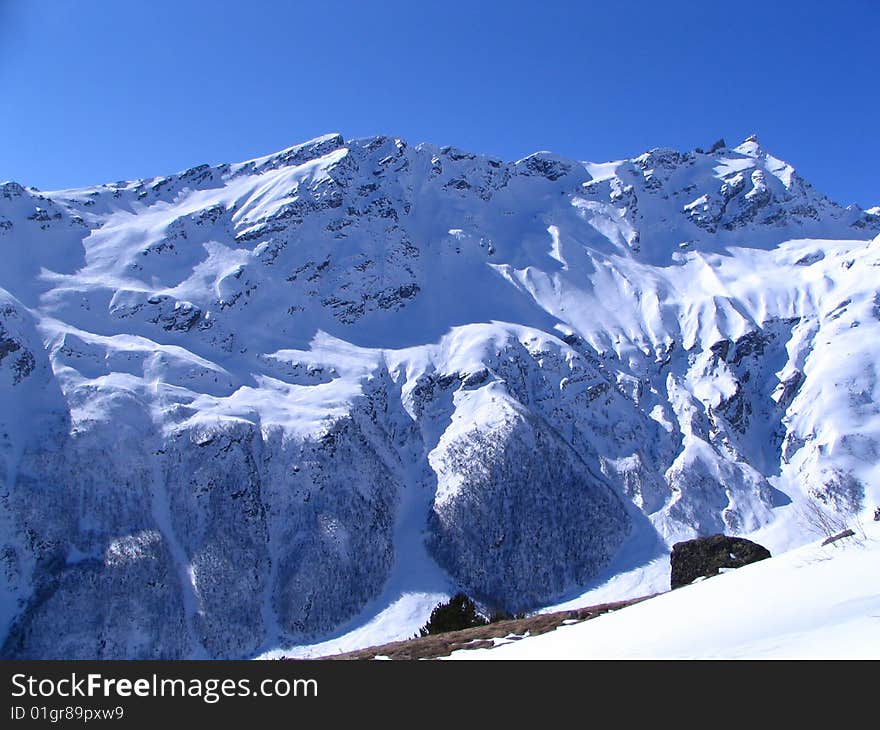 Russia. Caucaus. Elbrus edge.  Kind from the peak of Terskol. Practically all freeride-routes of north slope are visible. Russia. Caucaus. Elbrus edge.  Kind from the peak of Terskol. Practically all freeride-routes of north slope are visible