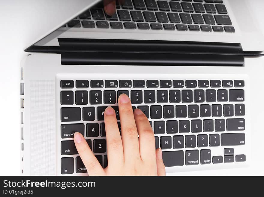 Girl hands typing on keyboard