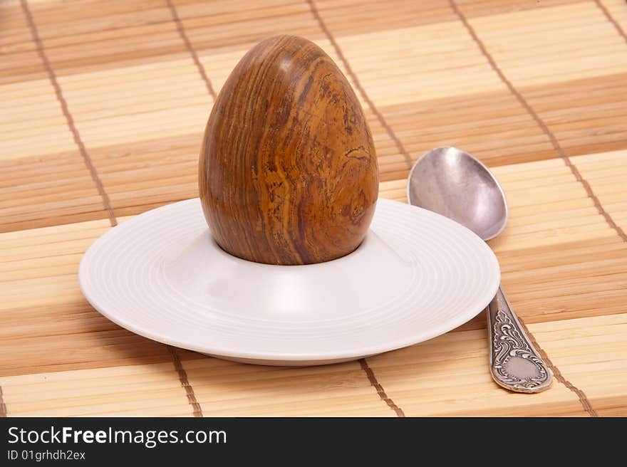 Served Stone Egg In A Rest Under Egg