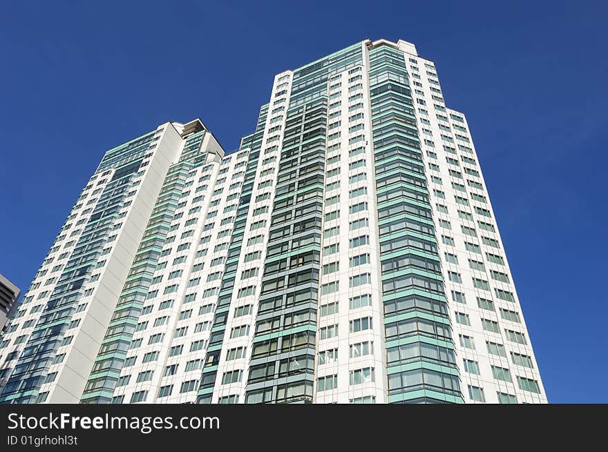 Very high apartment in blue sky