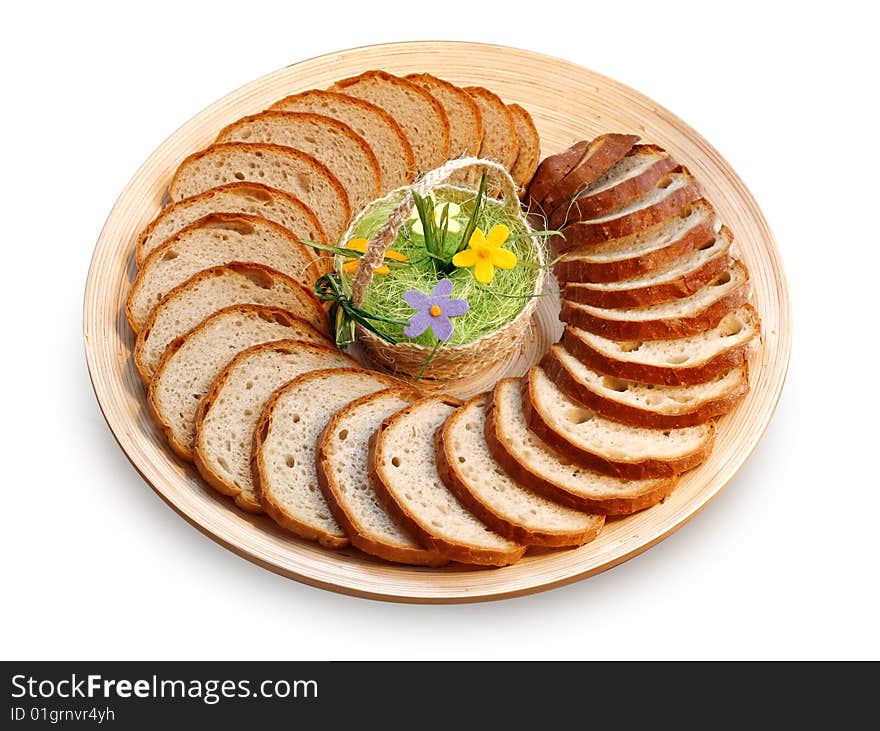 Wheat bread on salver, sliced loaf of golden-brown bread, festive holiday bread