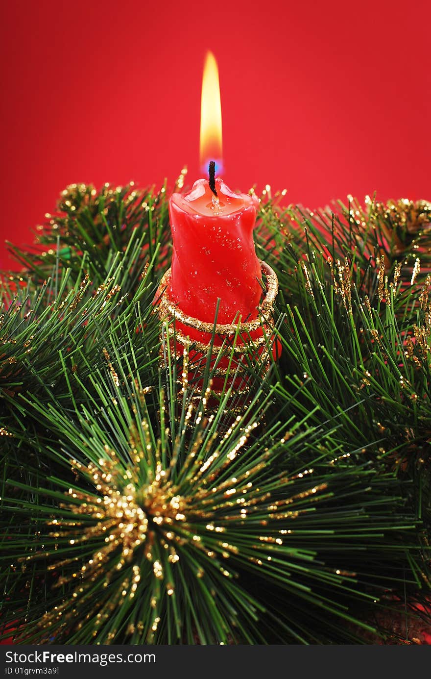 Durning candle on red background. Durning candle on red background