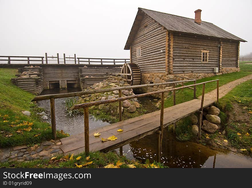 Wood mill on the river. Wood mill on the river