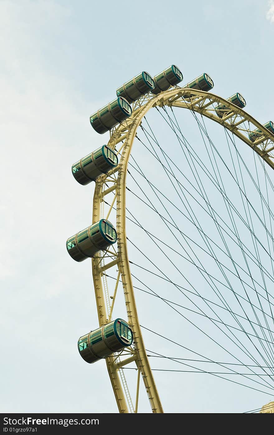 Multiple cabins of a local observation wheel for tourists to visit. Multiple cabins of a local observation wheel for tourists to visit.