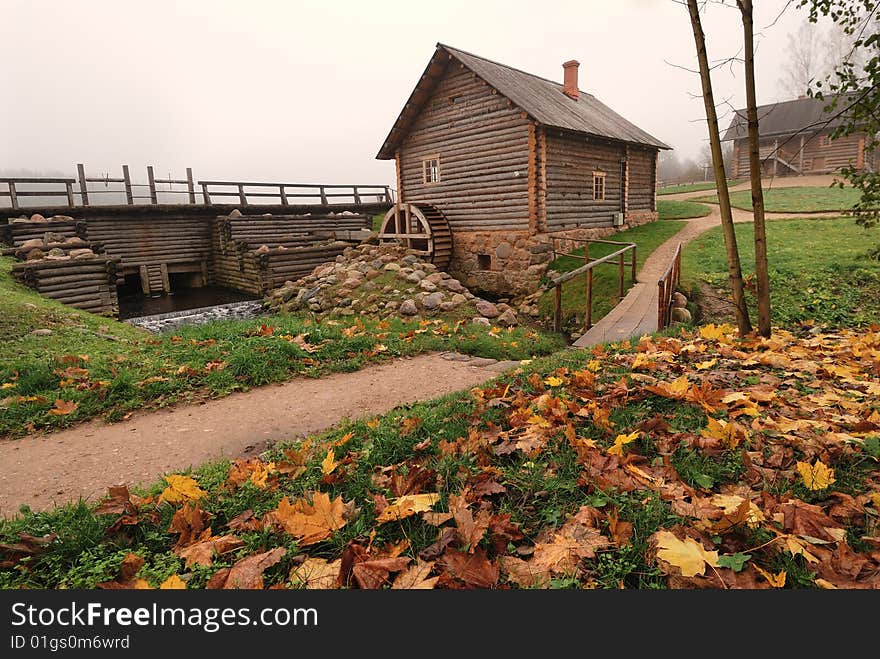 Wood mill  on the river. Wood mill  on the river