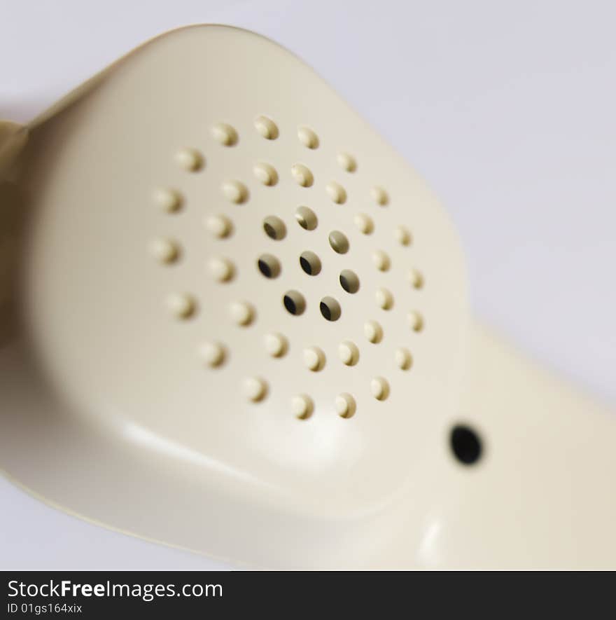 Communication equipment. telephone receiver on white