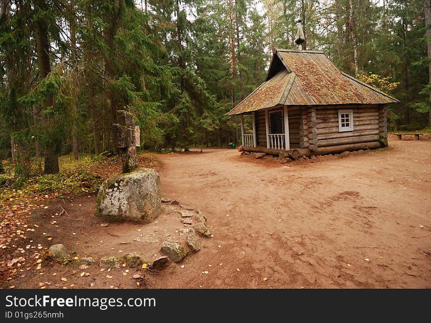 The ancient chapel with a cross. The ancient chapel with a cross