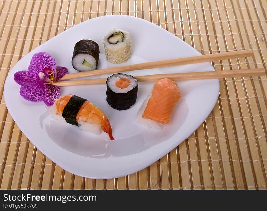 Apanese sushi rolls with orchid