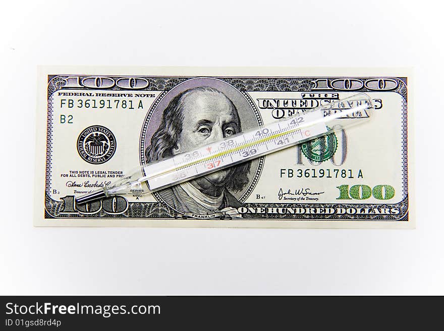 Isolated hundred dollars with thermometer