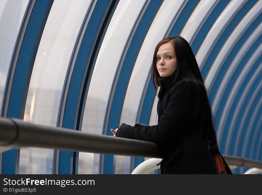 Portrait of the young sad woman with black hair