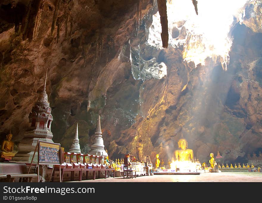 Cave with direct sunlight from the top. Cave with direct sunlight from the top.