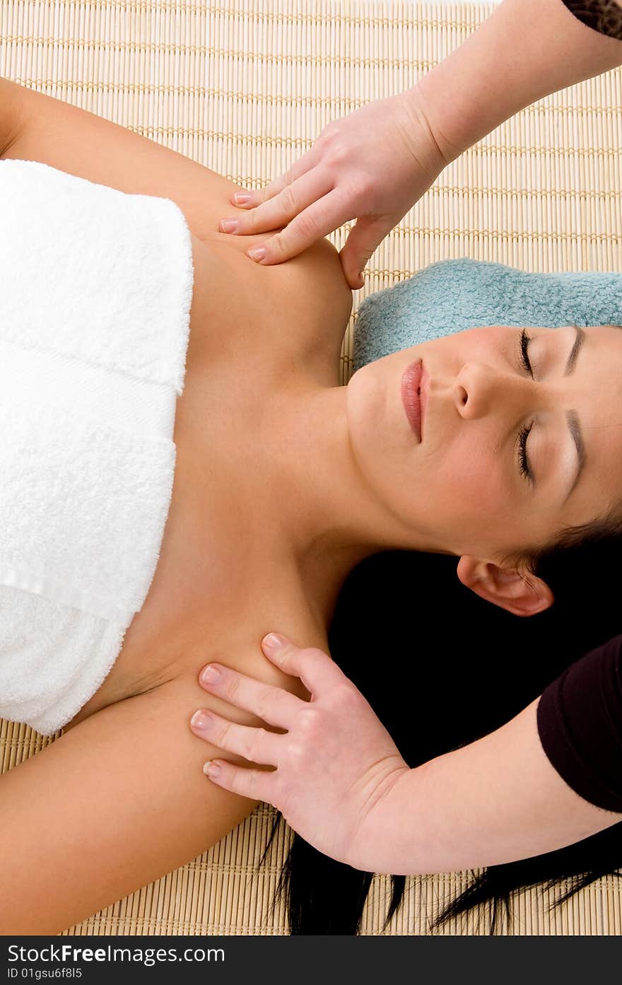 Smiling woman scrubbing her body