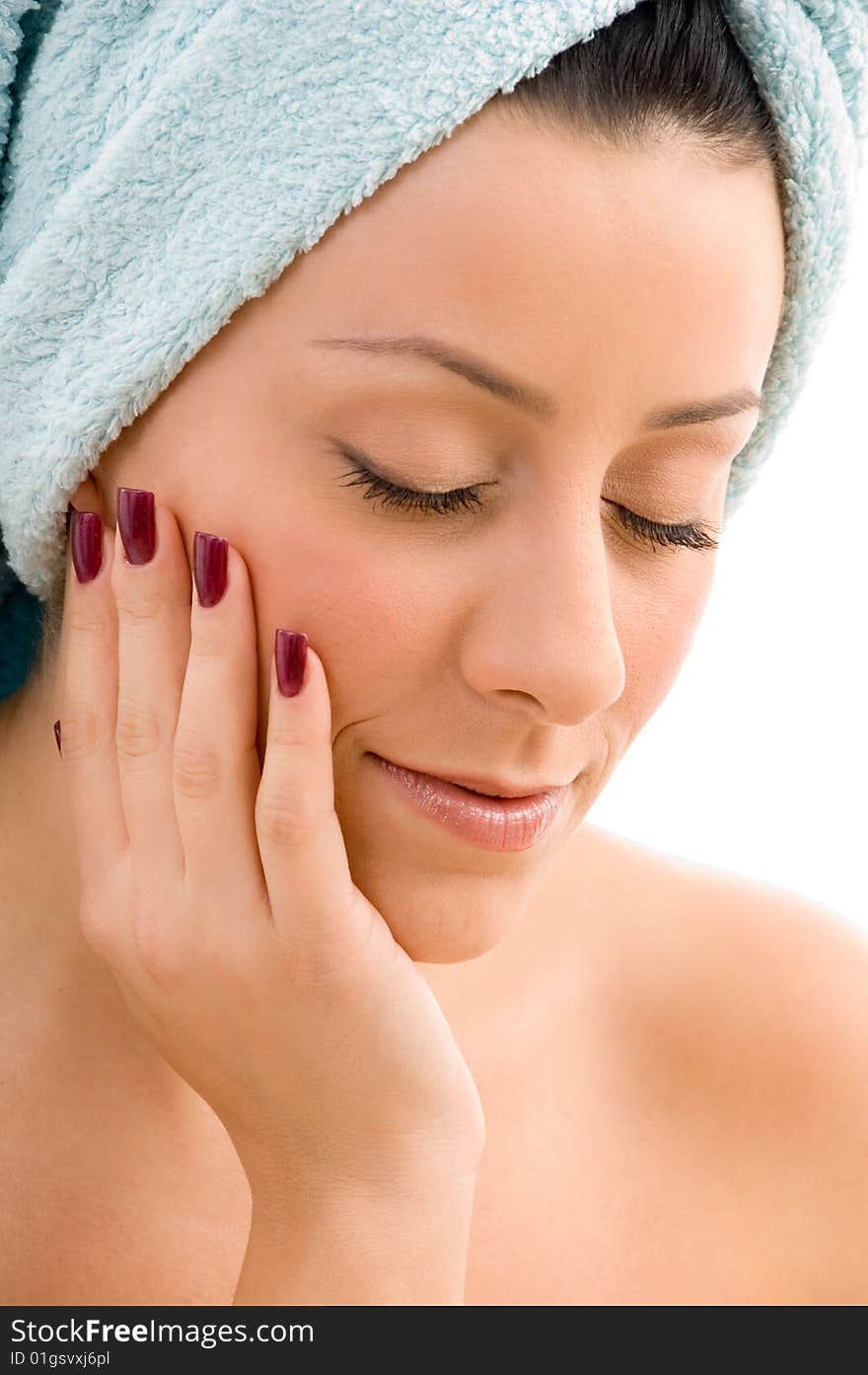 Top view of smiling young woman scrubbing her body against white background. Top view of smiling young woman scrubbing her body against white background