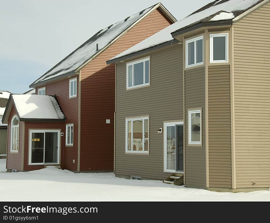 New homes back yard view in winter