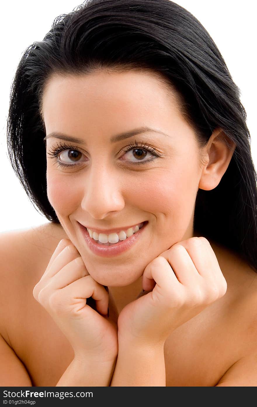 Close up of smiling young woman looking at camera with white background. Close up of smiling young woman looking at camera with white background