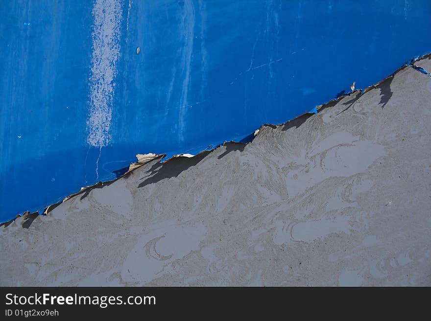 Grey metal texture with peeling blue paint. Grey metal texture with peeling blue paint.