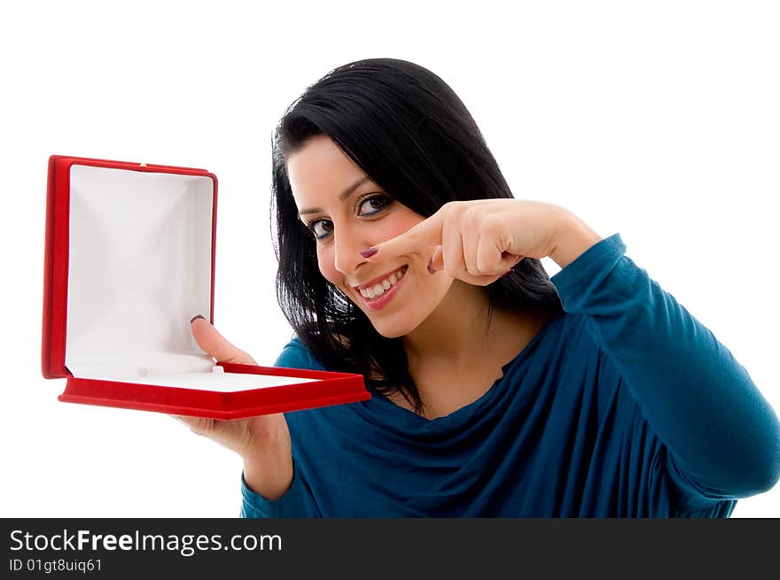 Smiling pointing female on white background