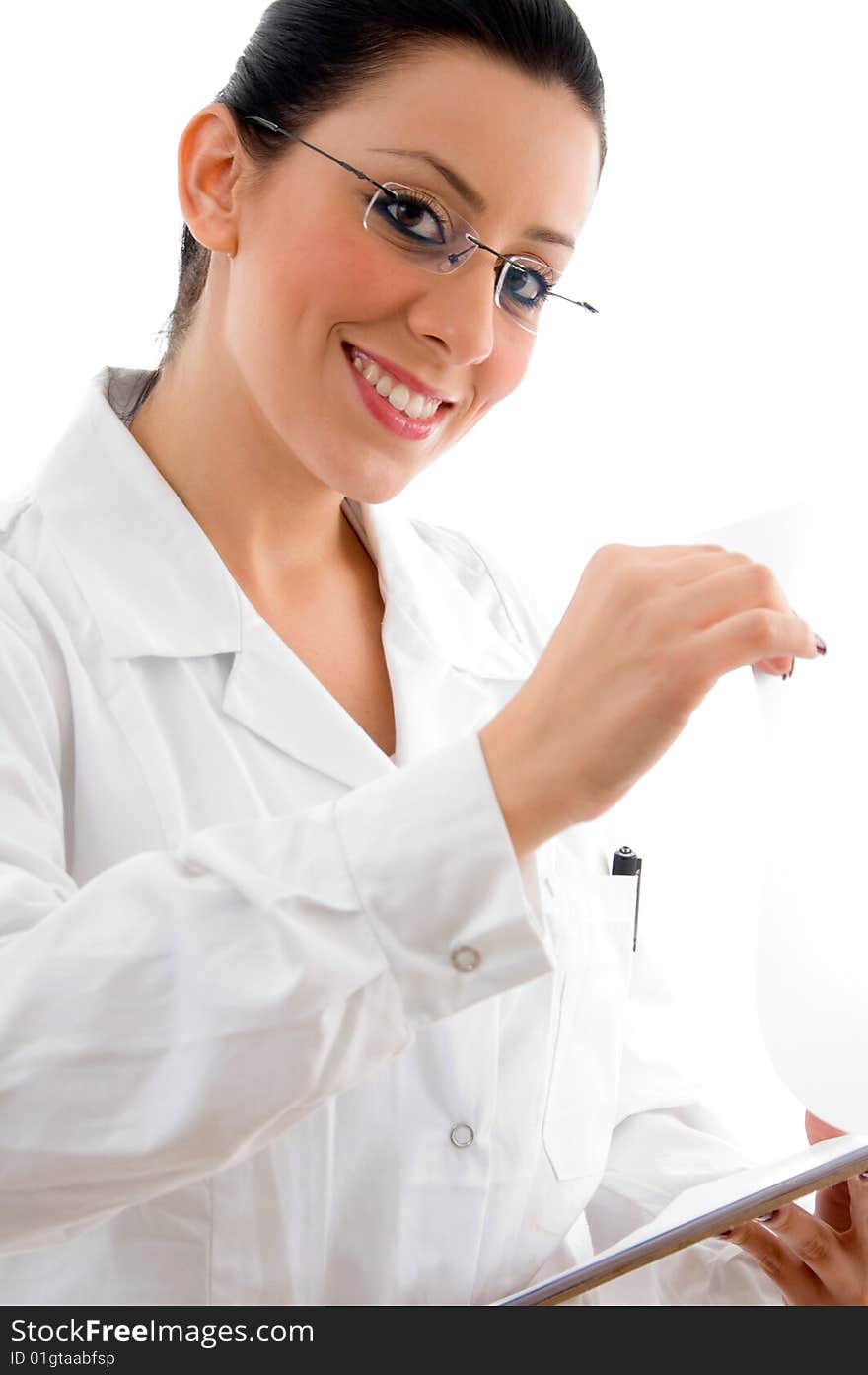 Side pose of smiling doctor looking at camera on an isolated white background. Side pose of smiling doctor looking at camera on an isolated white background