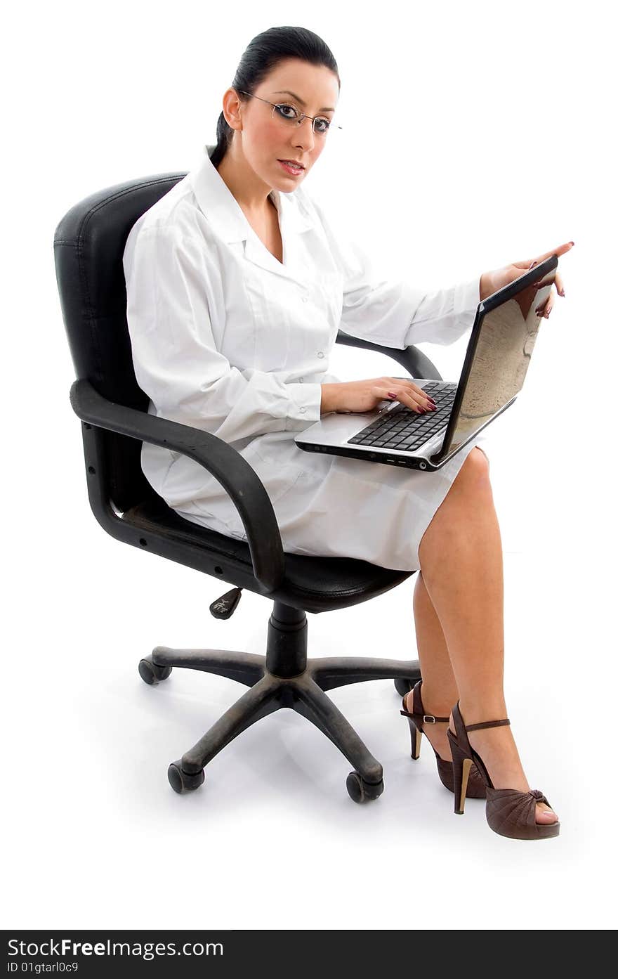 Side view of doctor doing work on laptop on an isolated background. Side view of doctor doing work on laptop on an isolated background