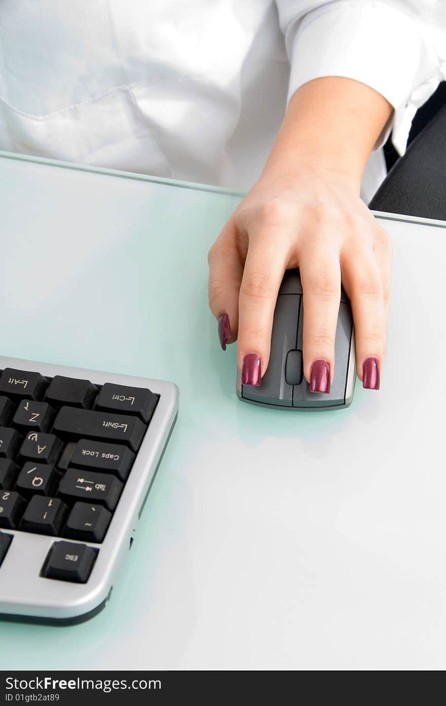 Mouse in female hand and keyboard. Mouse in female hand and keyboard