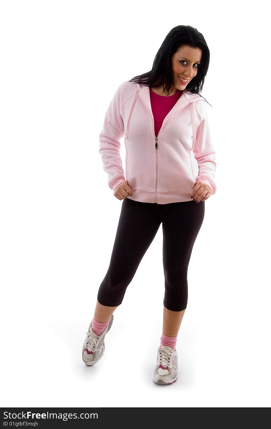 Front view of smiling standing woman on an isolated white background. Front view of smiling standing woman on an isolated white background