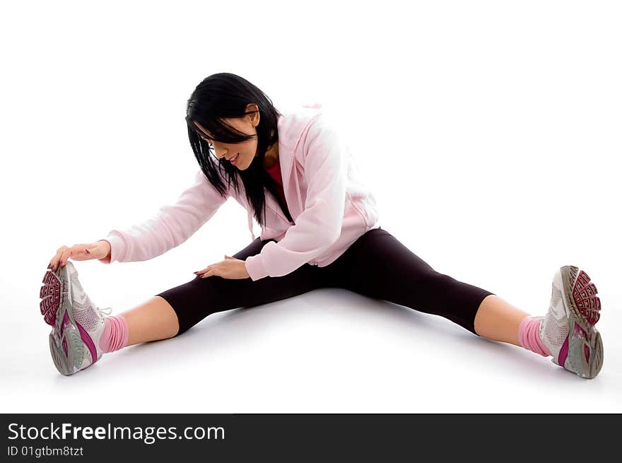 Front view of exercising woman on white background