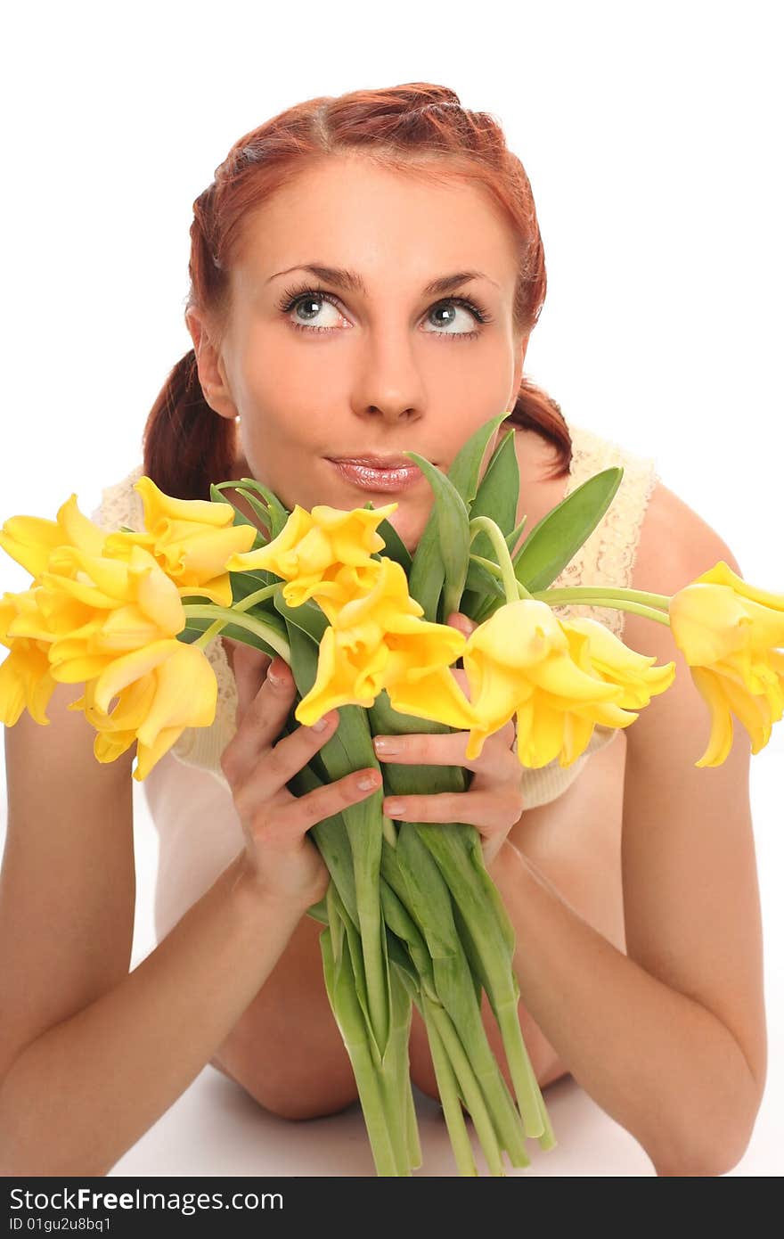 Cute young woman with yellow tulips. Cute young woman with yellow tulips