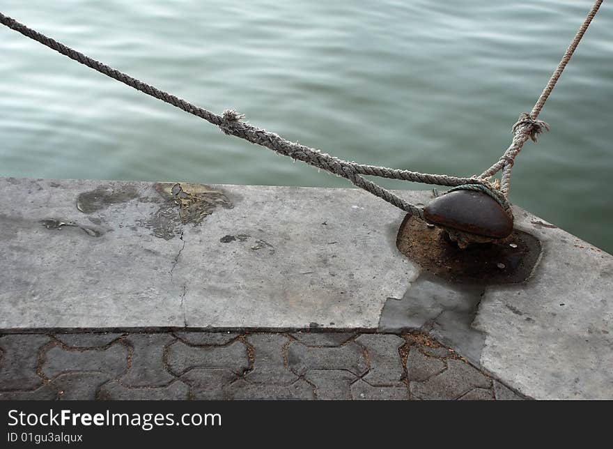 Hook and ship rope. Ship mooring