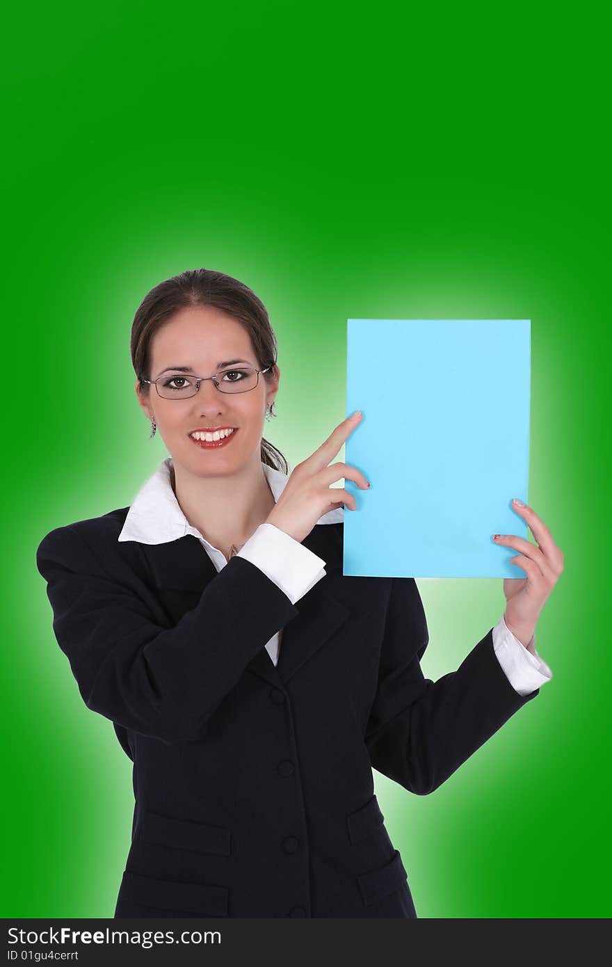 Woman with blue paper for text isolated on green